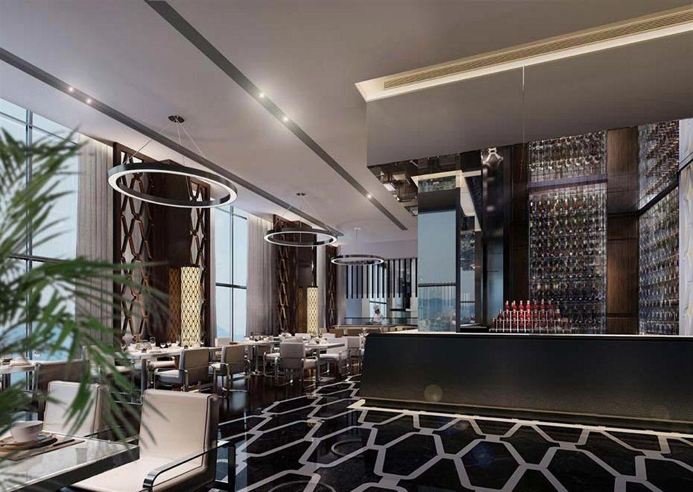 라미 그랜드 호텔 앤 스파 마나마 외부 사진 The interior of the restaurant